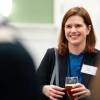 Woman smiling in crowd